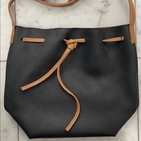 Navy and tan vegan leather cross body bag. - Picture 2 of 5